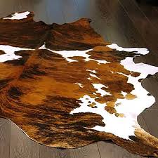 Versatile Elegance: How a Tricolor Cowhide Rug Enhances Home Décor and Comfort